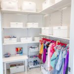A Closet Space for Kids With White Organizers